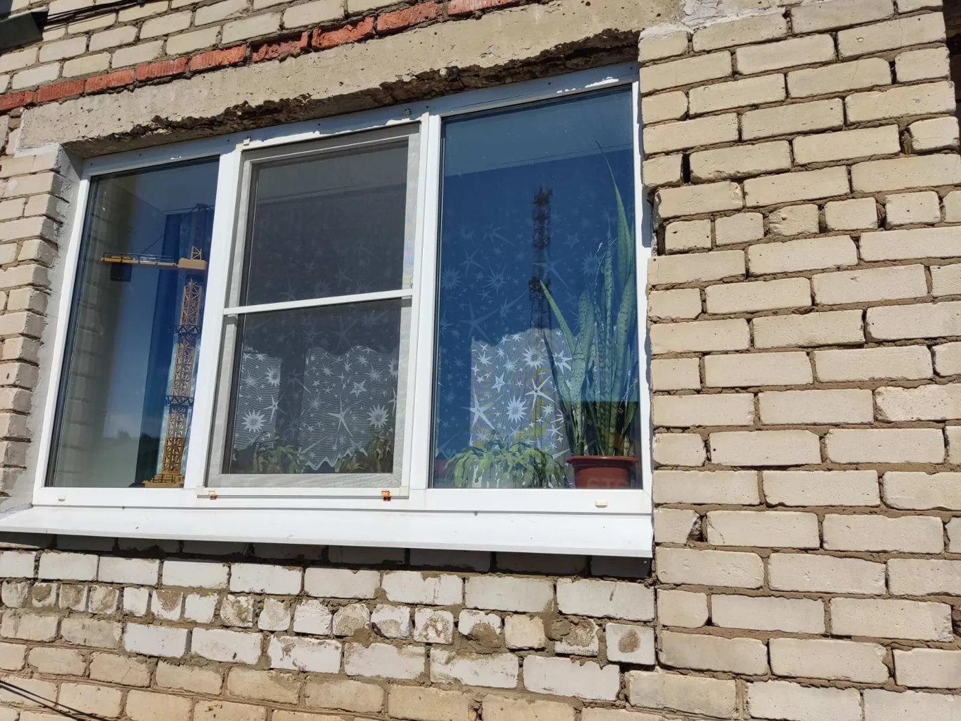 Окно ПВХ в кирпичном доме